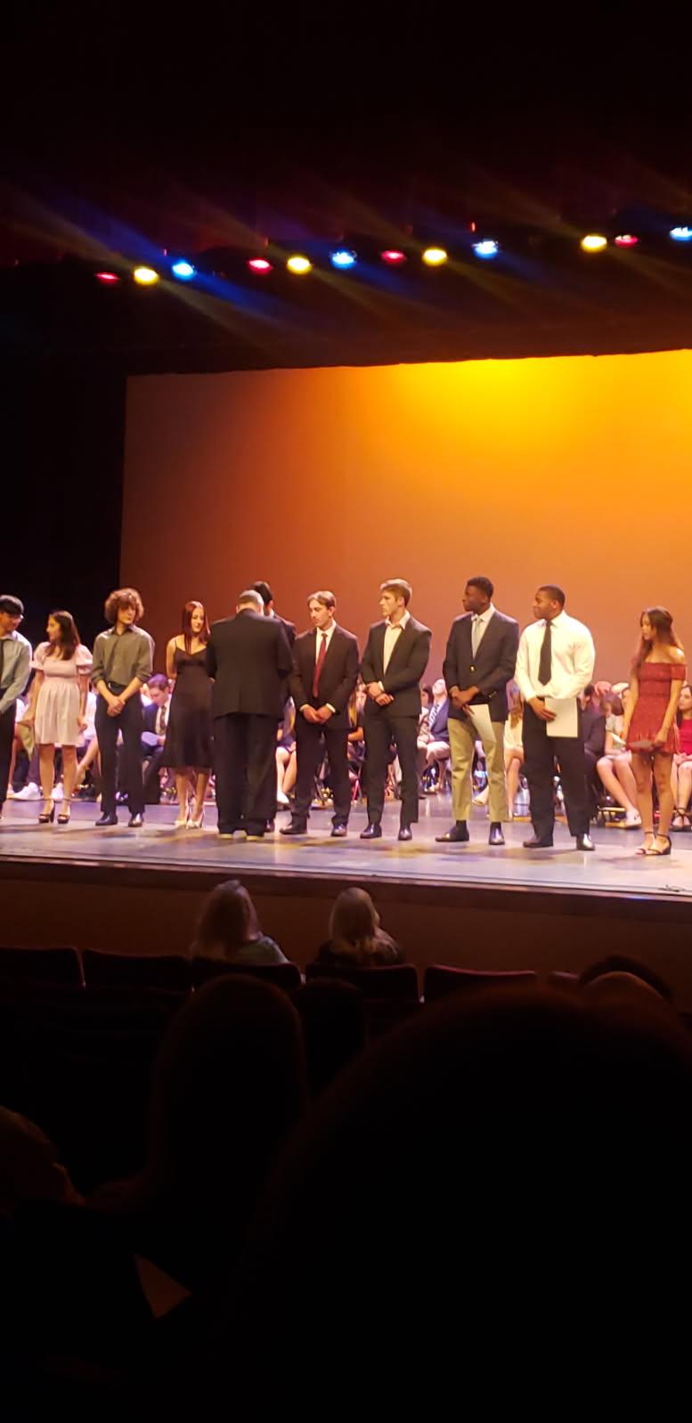 Reciving Project Synergy Award on Stage